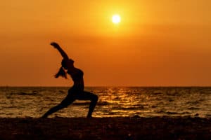 Balance meditation yoga spirit life mind woman peace vitality, silhouette outdoors on the Sea sunset, relax vital abstract. Healthy Life and Lifestyle Concept